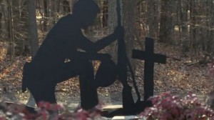 North Carolina city removes sculpture of soldier kneeling before cross