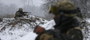 Ukraine troops begin retreat from battered railway hub as cease-fire crumbles